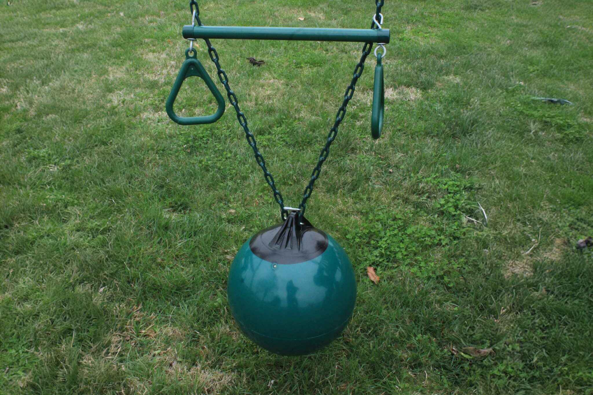 This versatile accessory doubles as both a swing and climbing challenge. The durable plastic buoy ball is weather-resistant and features a textured surface for better grip, perfect for active play.